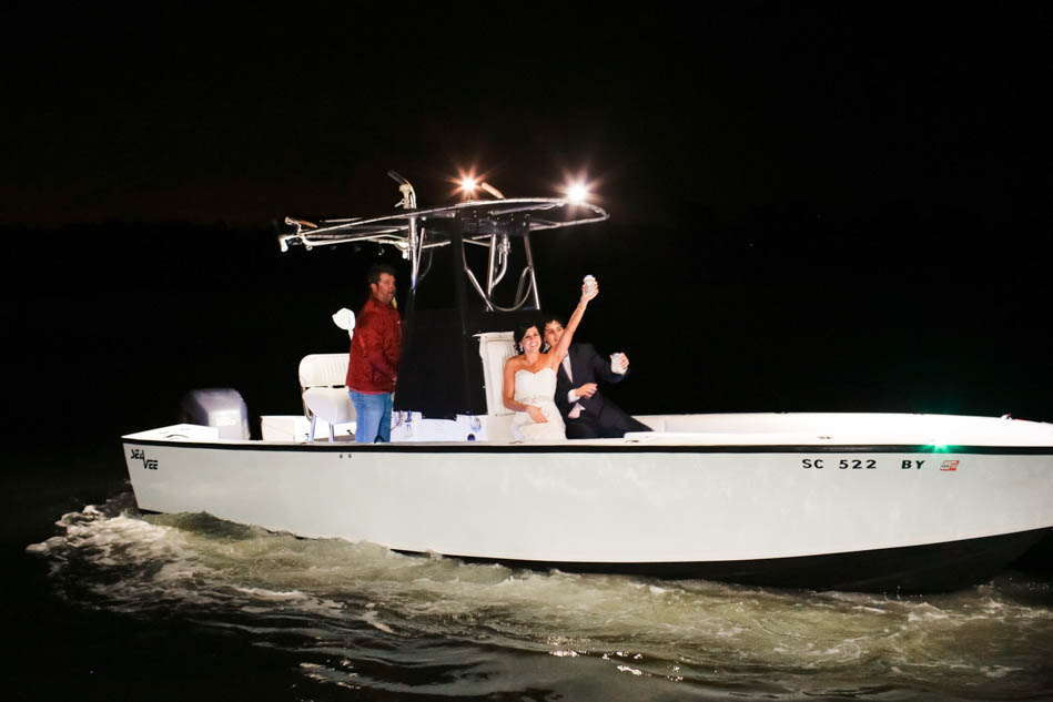 Bride and groom have boat exit, I'ON Creek Club, Mt Pleasant, South Carolina Kate Timbers Photography. http://katetimbers.com #katetimbersphotography // Charleston Photography // Inspiration