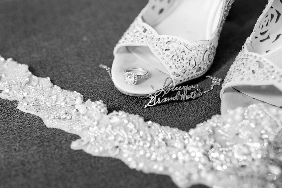 Shoes and bride's jewelry sit on cloth, I'ON Creek Club, Mt Pleasant, South Carolina Kate Timbers Photography. http://katetimbers.com #katetimbersphotography // Charleston Photography // Inspiration