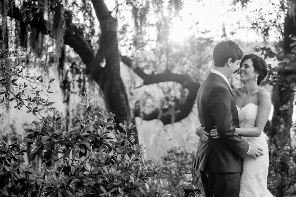 Bride and groom stand under oak tree at sunset, I'ON Creek Club, Mt Pleasant, South Carolina Kate Timbers Photography. http://katetimbers.com #katetimbersphotography // Charleston Photography // Inspiration
