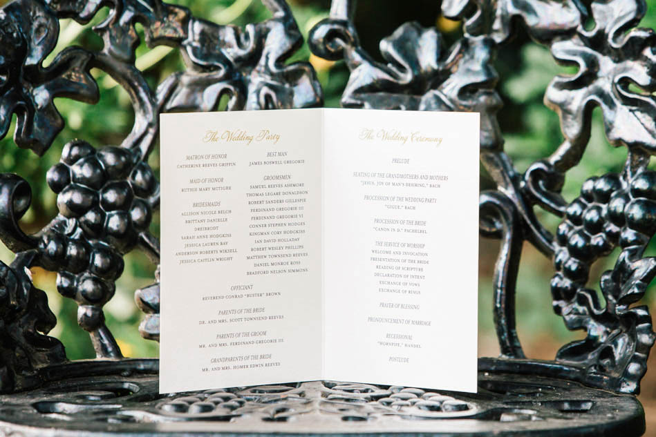 Wedding program rests in wrought iron chair, Oakland Plantation, Mt Pleasant, South Carolina Kate Timbers Photography. http://katetimbers.com #katetimbersphotography // Charleston Photography // Inspiration