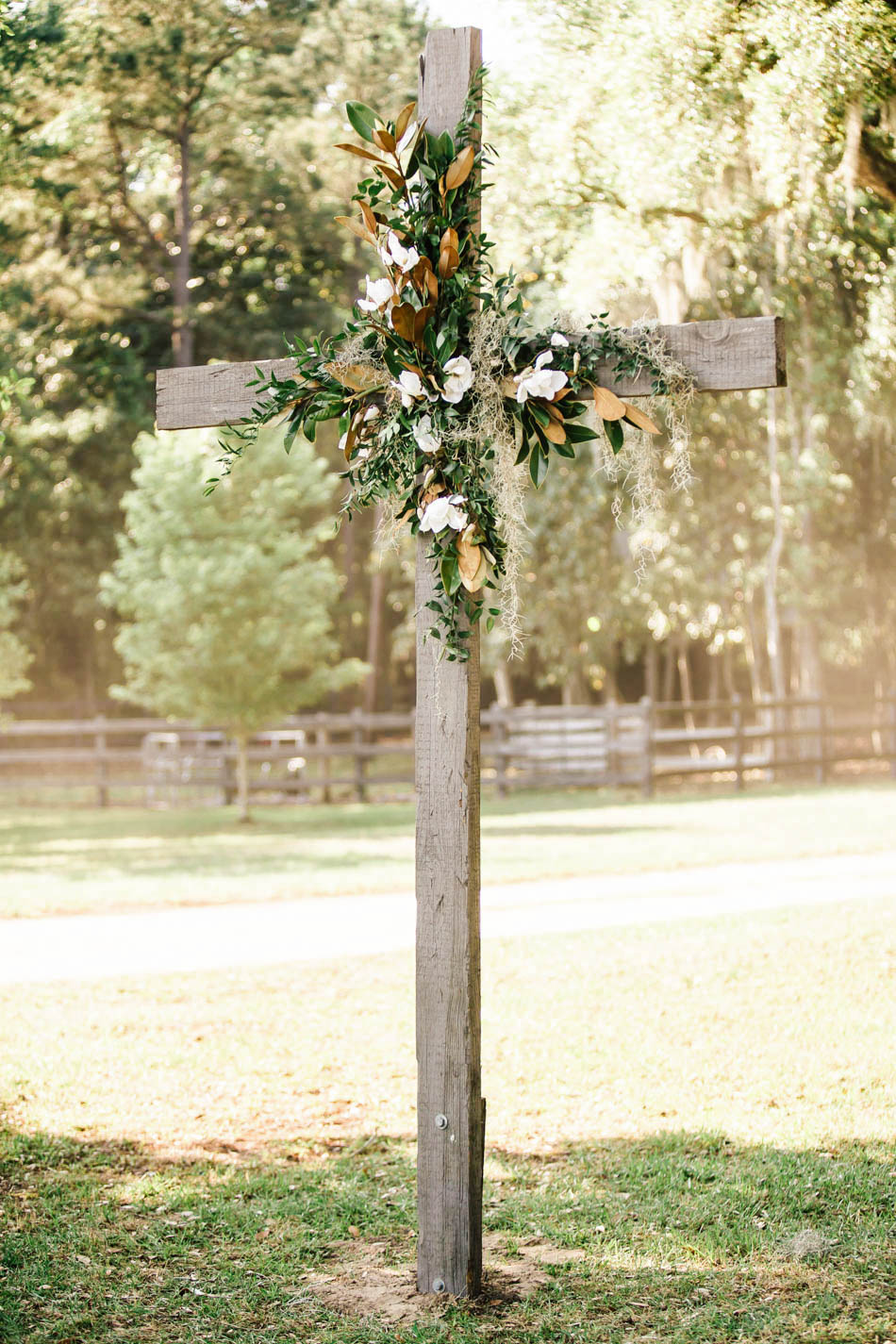Cross is decorated with magnolias, Oakland Plantation, Mt Pleasant, South Carolina Kate Timbers Photography. http://katetimbers.com #katetimbersphotography // Charleston Photography // Inspiration