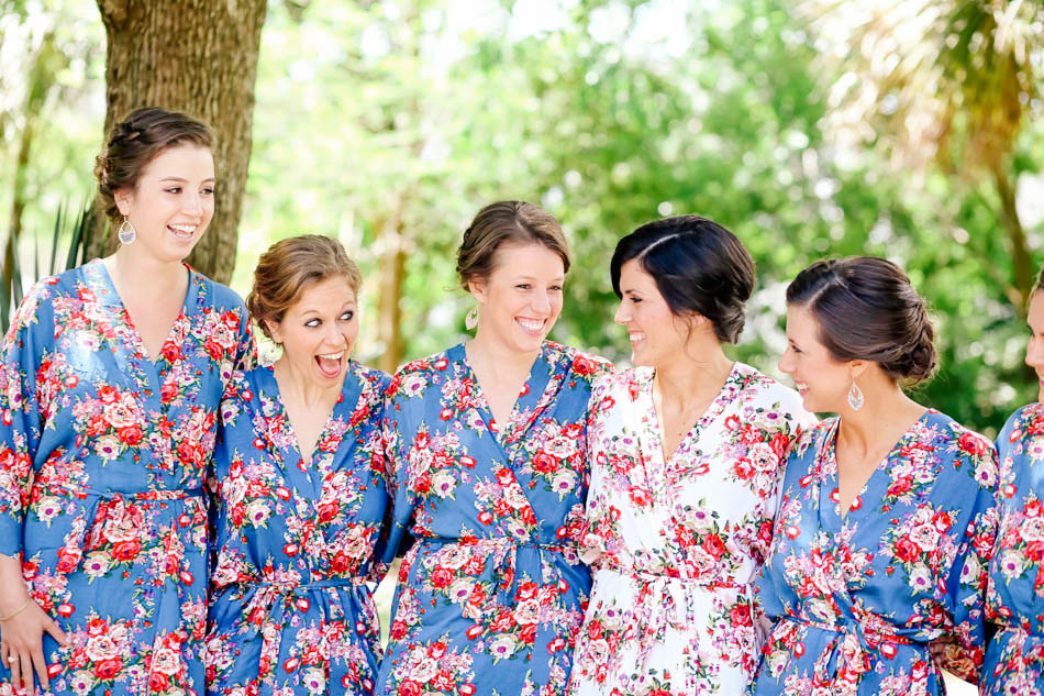 Bride smiles with bridesmaids in floral bathrobes, I'ON Creek Club, Mt Pleasant, South Carolina Kate Timbers Photography. http://katetimbers.com #katetimbersphotography // Charleston Photography // Inspiration