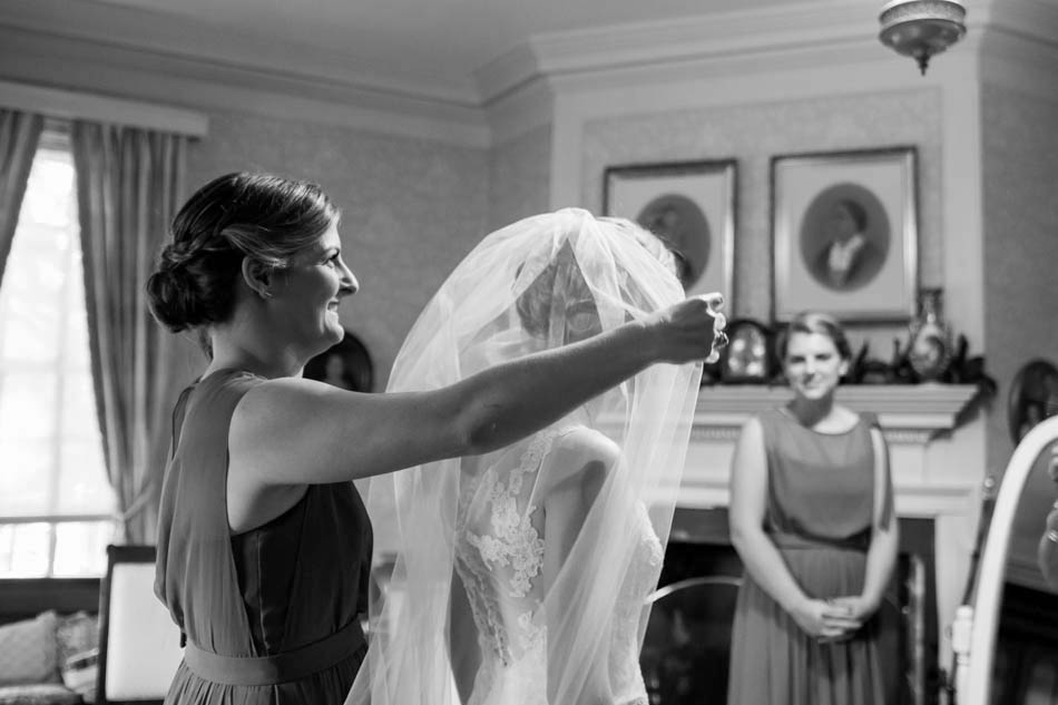 Bride gets veil on, Oakland Plantation, Mt Pleasant, South Carolina Kate Timbers Photography. http://katetimbers.com #katetimbersphotography // Charleston Photography // Inspiration