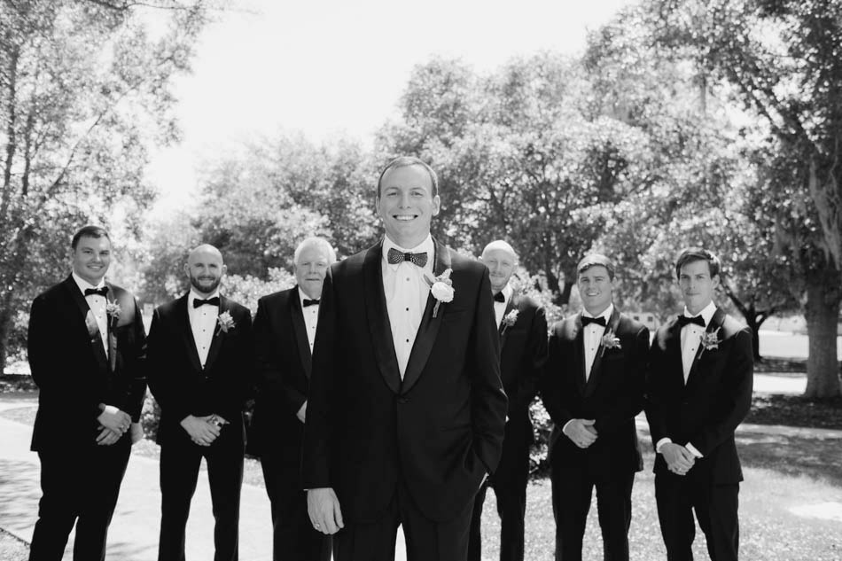 Groom poses with groomsmen, Summerall Chapel, South Carolina Kate Timbers Photography. http://katetimbers.com #katetimbersphotography // Charleston Photography // Inspiration