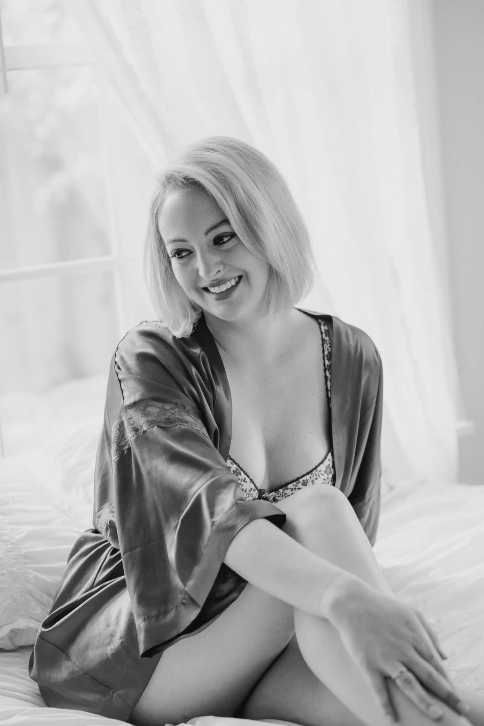 Ms M wears a silky navy blue robe in bed, Boudoir Photography, Charleston, SC Kate Timbers Photography. http://katetimbers.com #katetimbersphotography // Charleston Photography // Inspiration