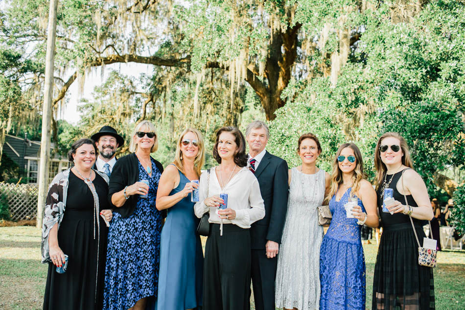 Guests mingle for cocktail hour under an oak tree, Oakland Plantation, Mt Pleasant, South Carolina Kate Timbers Photography. http://katetimbers.com #katetimbersphotography // Charleston Photography // Inspiration