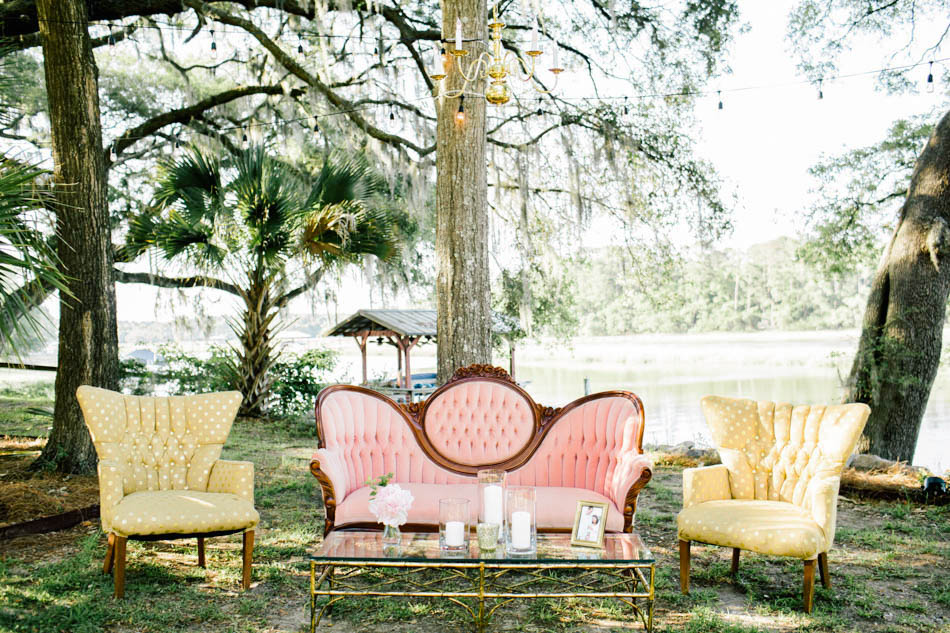 A lounge area is set up with vintage chairs, Wadmalaw Island, South Carolina Kate Timbers Photography. http://katetimbers.com #katetimbersphotography // Charleston Photography // Inspiration