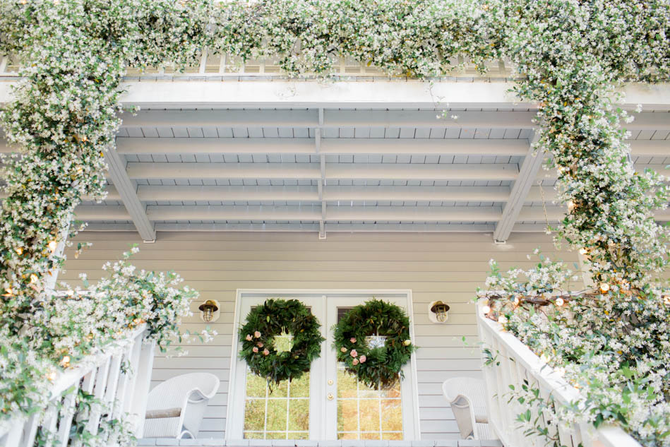Flowering vines cover the railings of a house, Wadmalaw Island wedding, South Carolina Kate Timbers Photography. http://katetimbers.com #katetimbersphotography // Charleston Photography // Inspiration