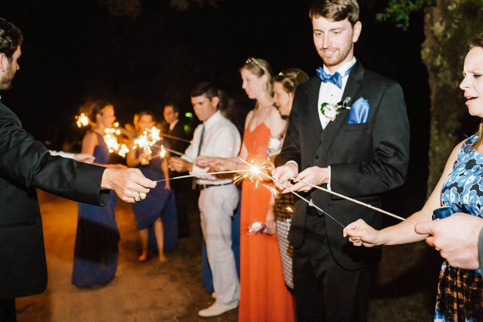 Guests light sparklers, Oakland Plantation, Mt Pleasant, South Carolina Kate Timbers Photography. http://katetimbers.com #katetimbersphotography // Charleston Photography // Inspiration