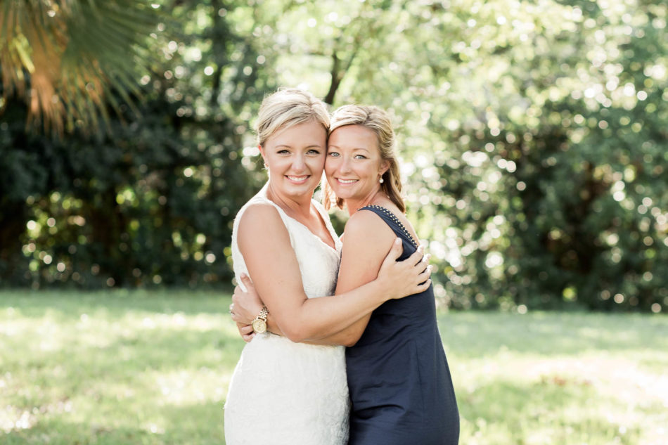 Bride and bridesmaid pose for portrait in old Mt Pleasant, South Carolina Kate Timbers Photography. http://katetimbers.com #katetimbersphotography // Charleston Photography // Inspiration