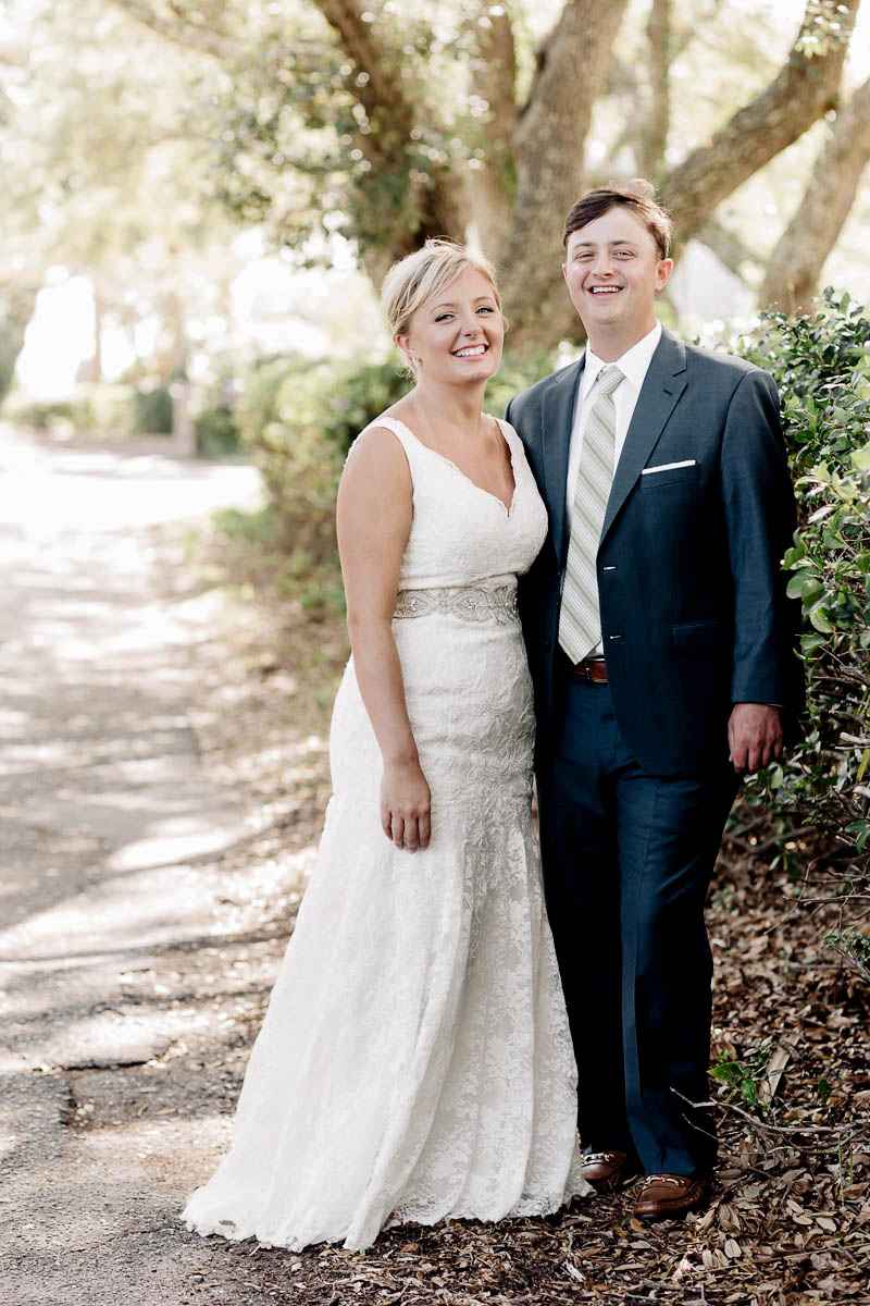 Bride and groom pose for portrait in old Mt Pleasant, South Carolina Kate Timbers Photography. http://katetimbers.com #katetimbersphotography // Charleston Photography // Inspiration