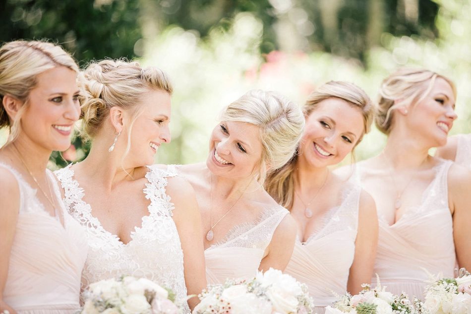 Bridesmaids hold bouquets in a row, Magnolia Plantation, Charleston, South Carolina Kate Timbers Photography. http://katetimbers.com #katetimbersphotography // Charleston Photography // Inspiration