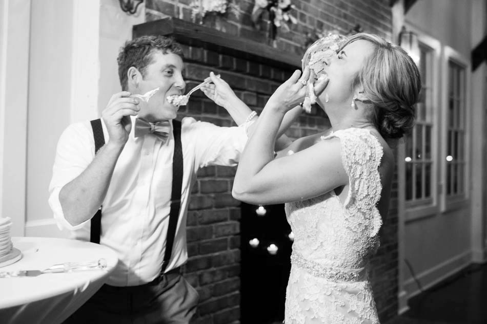 Bride and groom feed each other cake, Alhambra Hall, Mt Pleasant, South Carolina Kate Timbers Photography. http://katetimbers.com #katetimbersphotography // Charleston Photography // Inspiration