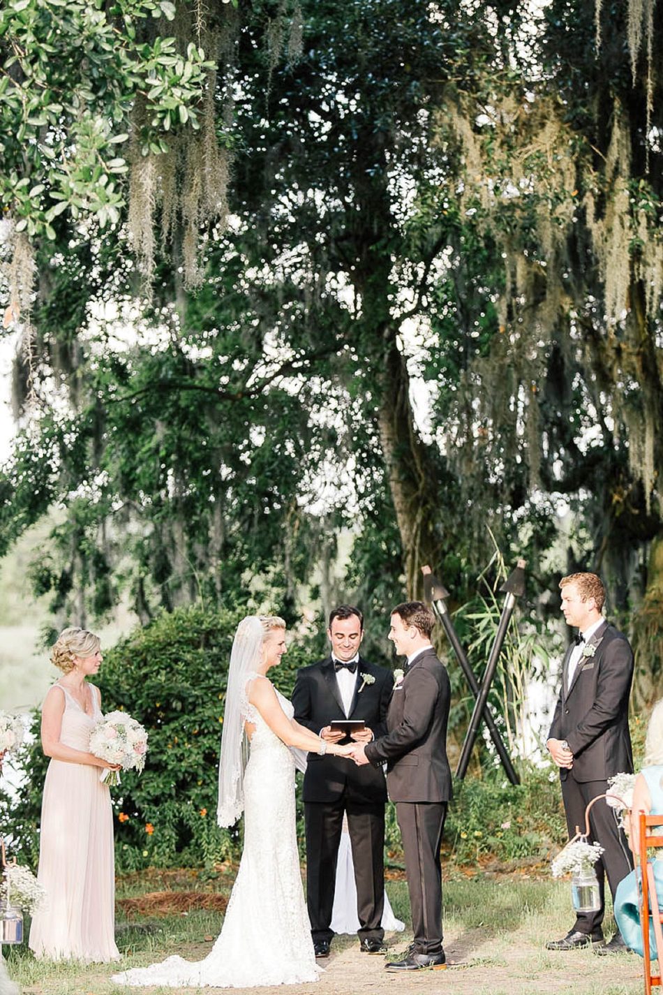 Bride and groom exchange vows, Magnolia Plantation, Charleston, South Carolina Kate Timbers Photography. http://katetimbers.com #katetimbersphotography // Charleston Photography // Inspiration