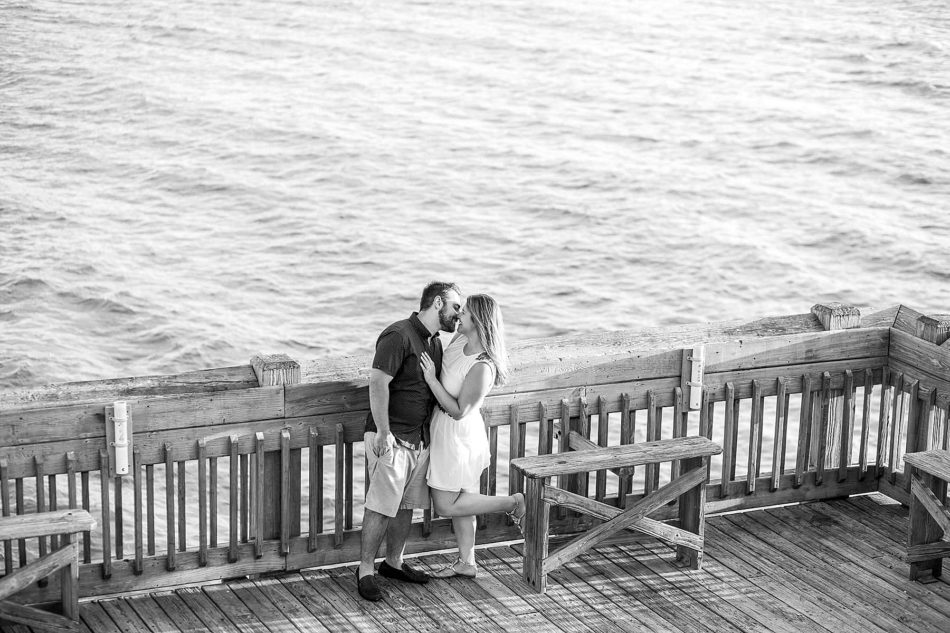Engaged Couple on fishing pier, Folly beach in Charleston, South Carolina Kate Timbers Photography. http://katetimbers.com #katetimbersphotography // Charleston Photography // Inspiration