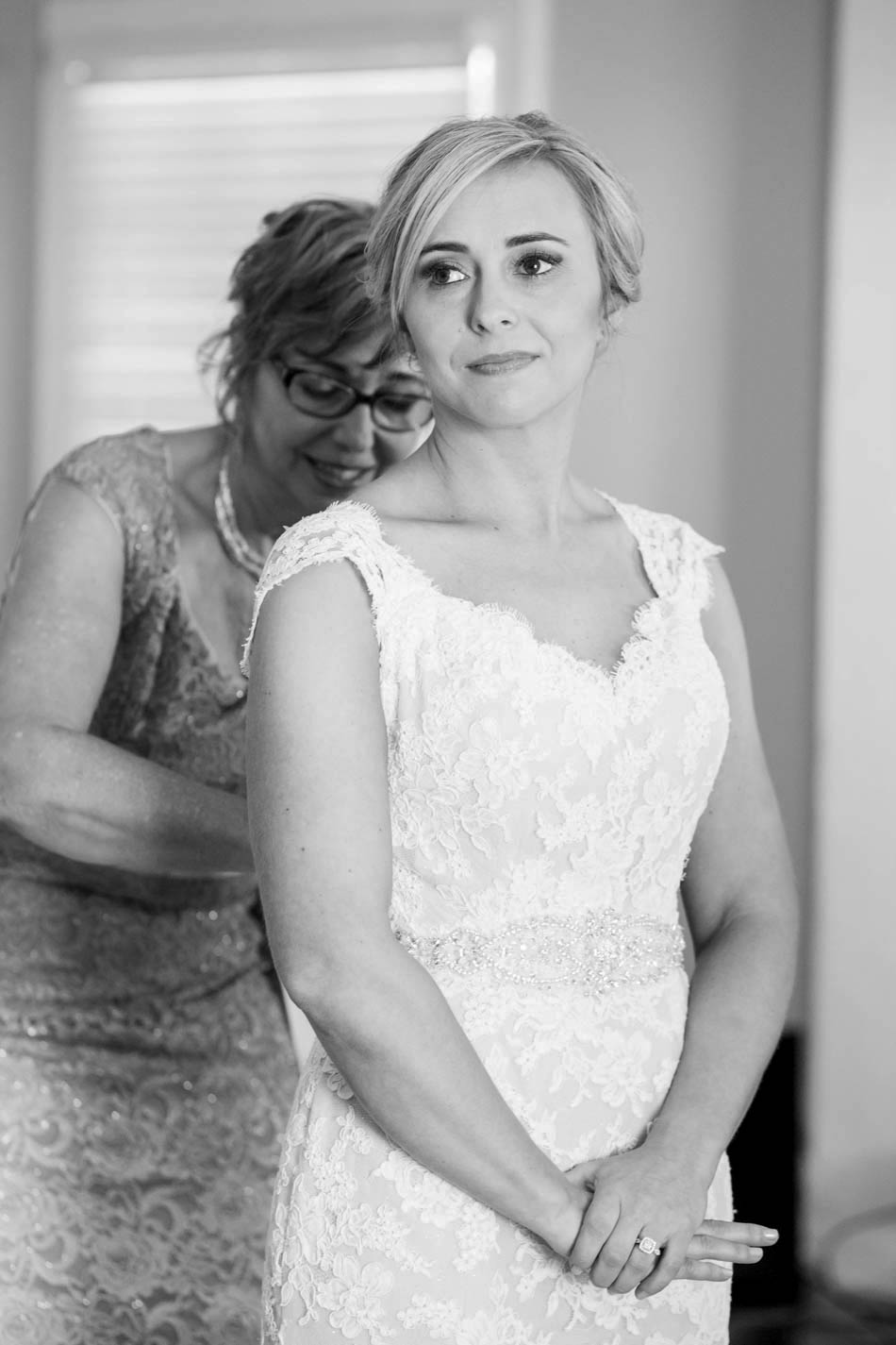 Bride gets into dress, Alhambra Hall, Mt Pleasant, South Carolina Kate Timbers Photography. http://katetimbers.com #katetimbersphotography // Charleston Photography // Inspiration