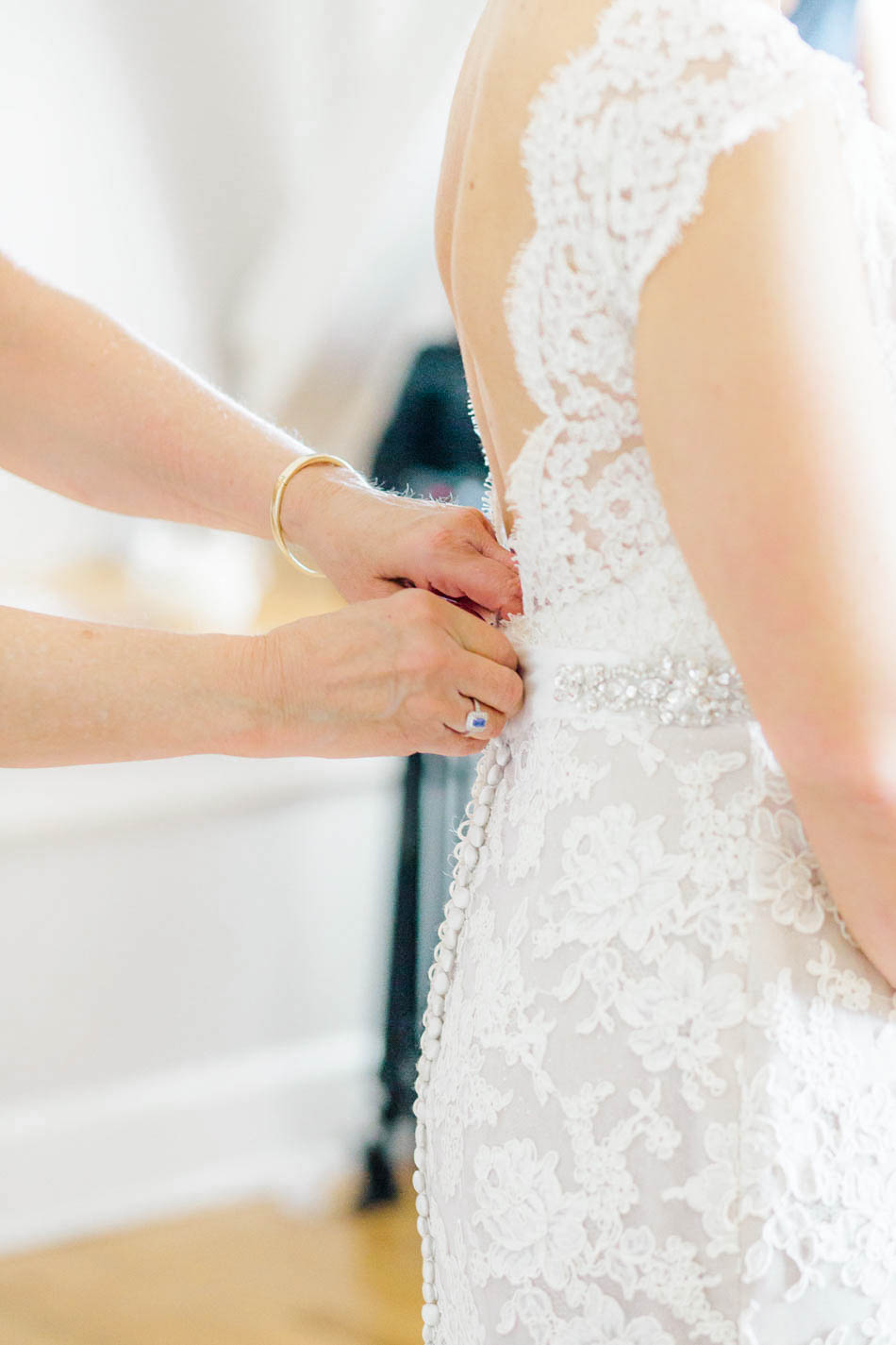 Bride gets into dress, Alhambra Hall, Mt Pleasant, South Carolina Kate Timbers Photography. http://katetimbers.com #katetimbersphotography // Charleston Photography // Inspiration