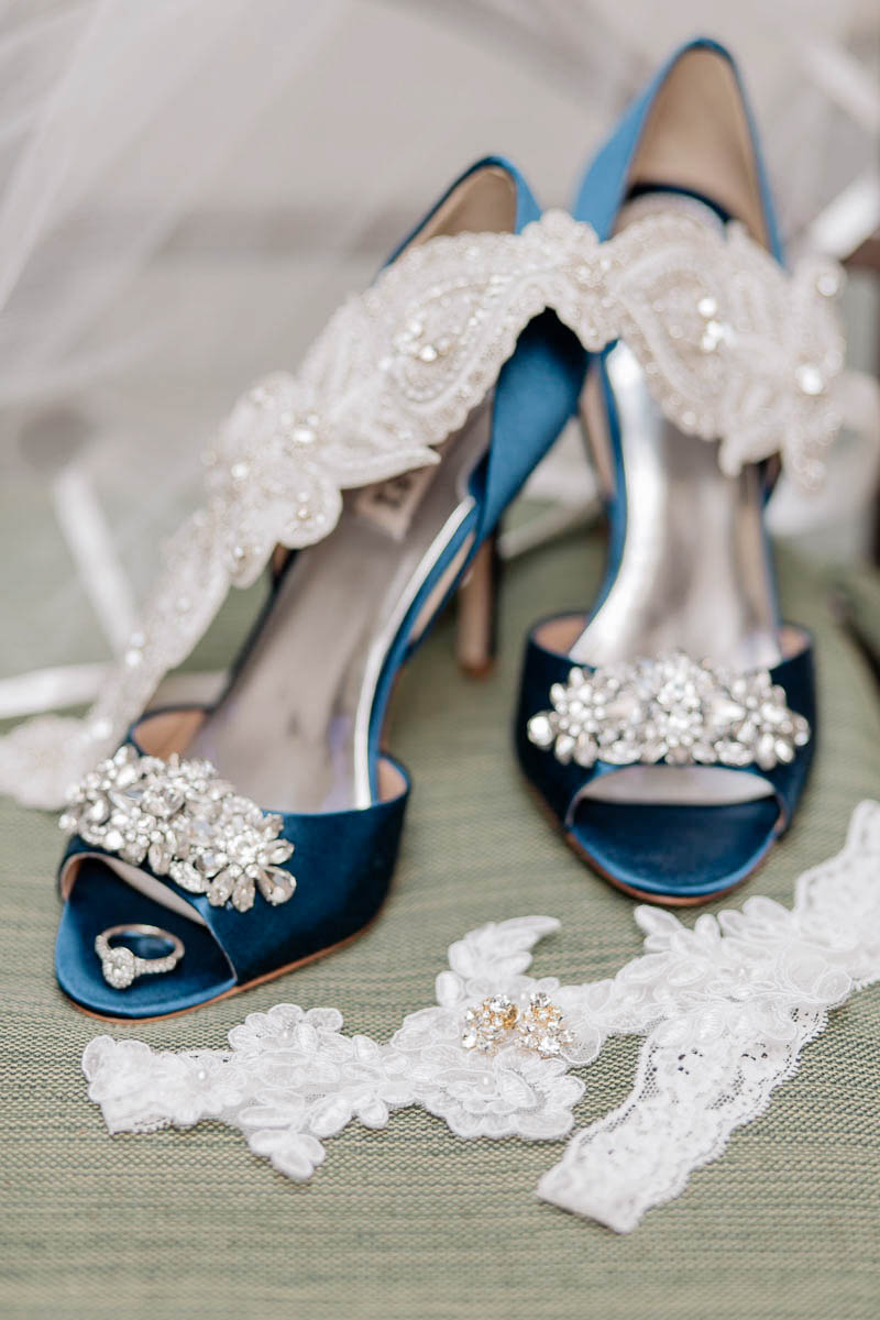 Bride's blue shoes, jewelry and garter sit on a chair, Wild Dunes, Charleston, South Carolina Kate Timbers Photography. http://katetimbers.com #katetimbersphotography // Charleston Photography // Inspiration