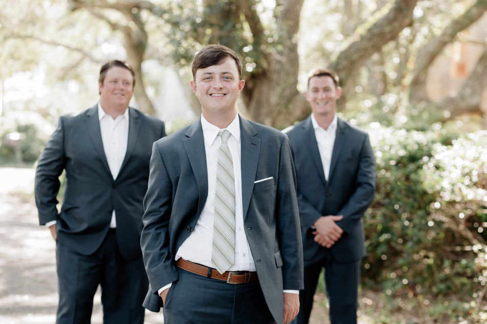 Groom and groomsmen pose for portrait in old Mt Pleasant, South Carolina Kate Timbers Photography. http://katetimbers.com #katetimbersphotography // Charleston Photography // Inspiration