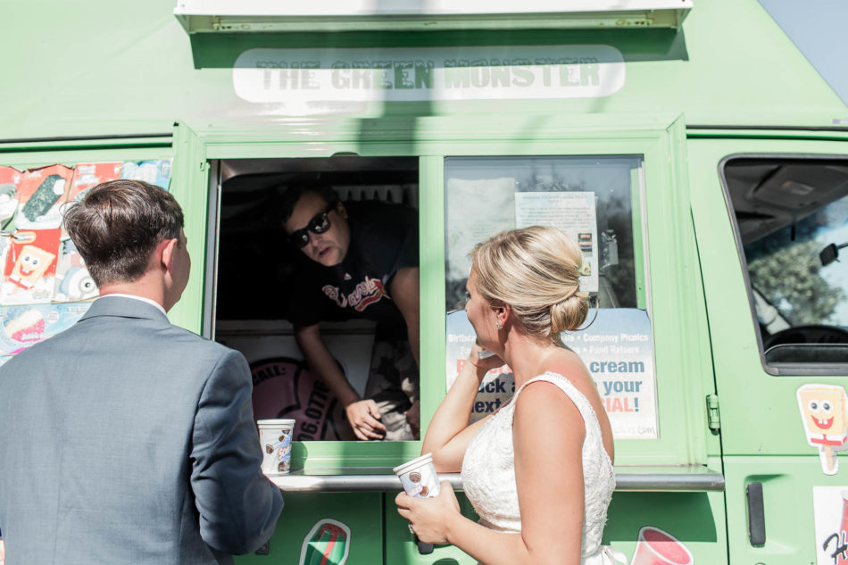 Bride and groom get a cone from the ice cream truck, Pitt St Bridge, Mt Pleasant, South Carolina Kate Timbers Photography. http://katetimbers.com #katetimbersphotography // Charleston Photography // Inspiration