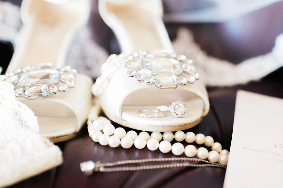 Shoes sit on a chair with garter belt and jewelry, Alhambra Hall, Mt Pleasant, South Carolina Kate Timbers Photography. http://katetimbers.com #katetimbersphotography // Charleston Photography // Inspiration