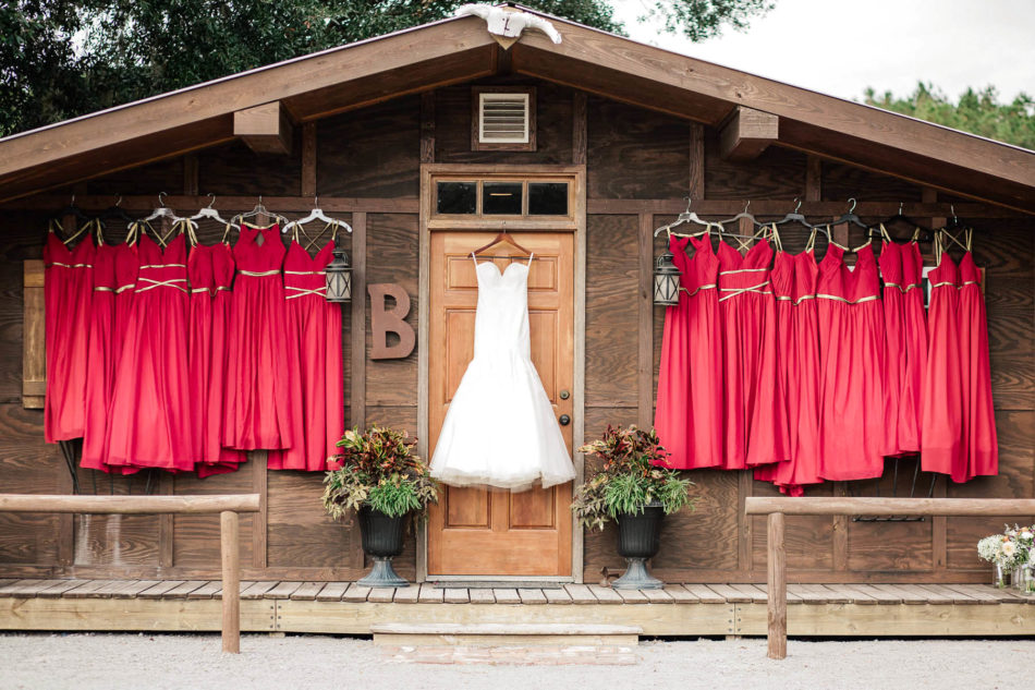 Wedding and bridesmaid dresses are hung in cabin, Boals Farm, Charleston, South Carolina Kate Timbers Photography. http://katetimbers.com #katetimbersphotography // Charleston Photography // Inspiration