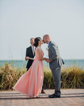 Bride and groom kiss, Seabrook Island Club, Charleston, South Carolina. www.katetimbers.com