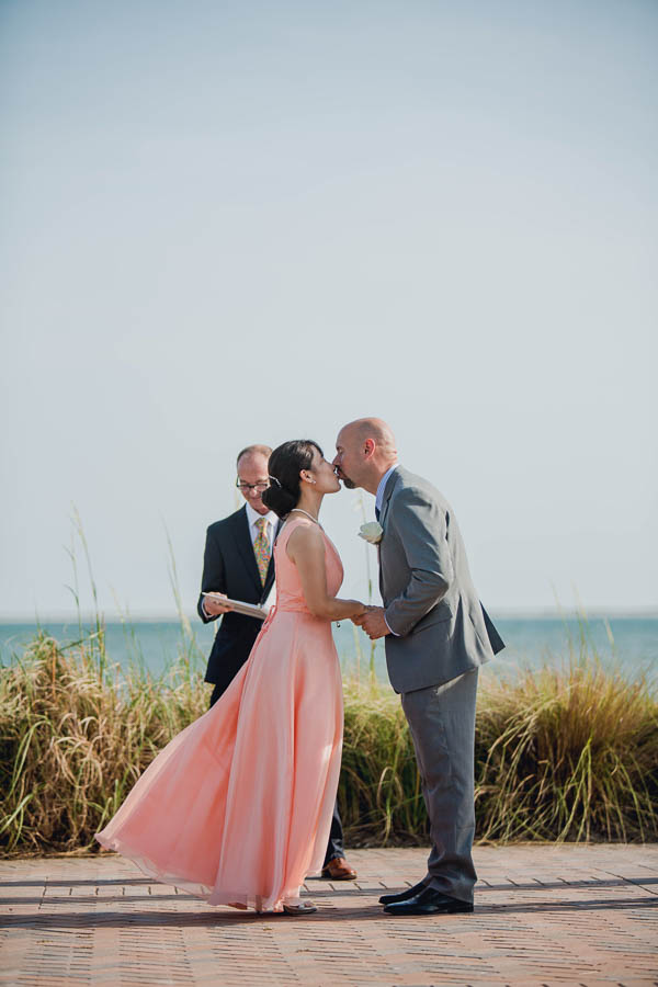 Bride and groom kiss, Seabrook Island Club, Charleston, South Carolina. www.katetimbers.com
