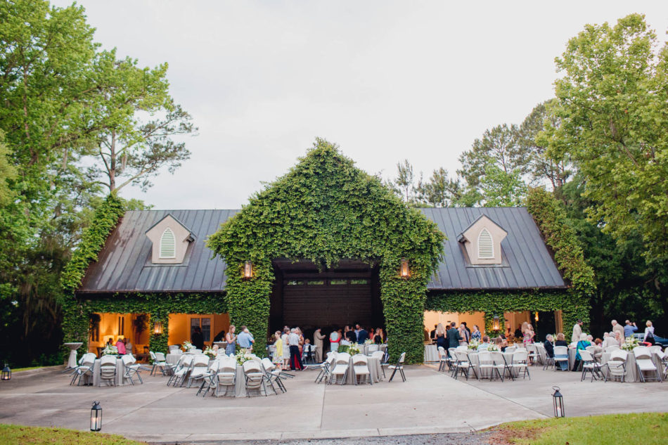 Guests mingle at reception, Old Wide Awake Plantation, Charleston, South Carolina. Kate Timbers Photography. katetimbers.com