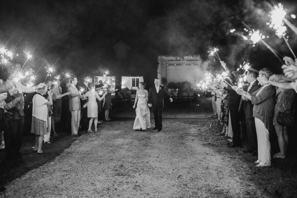 Bride and groom have sparkler exit, Old Wide Awake Plantation, Charleston, South Carolina. Kate Timbers Photography. katetimbers.com