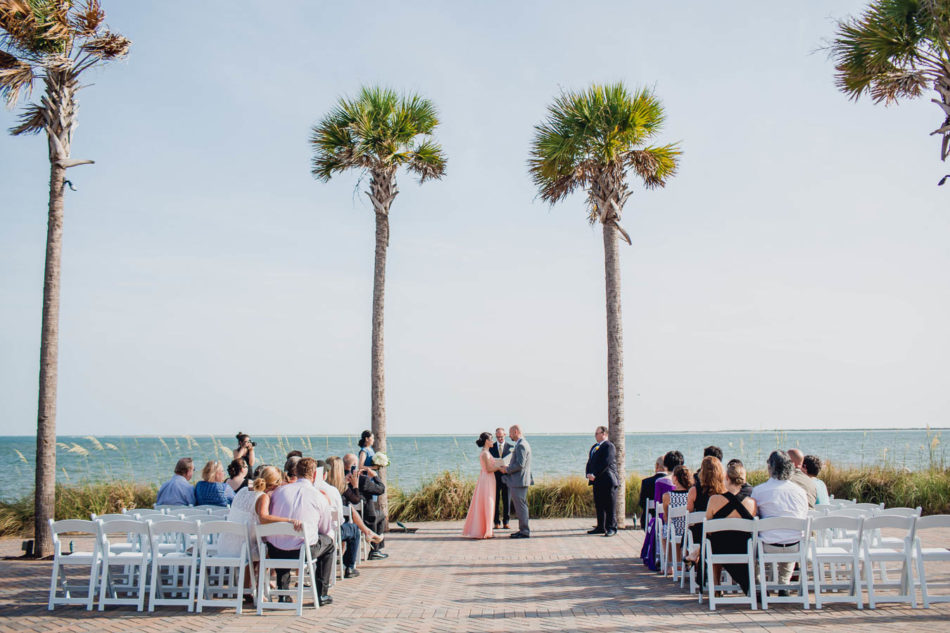 Bride and groom exchange vows, Seabrook Island Club, Charleston, South Carolina. www.katetimbers.com