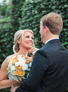 Bride and groom smile by ivy covered wall, Dunes West Golf and River Club, Mt Pleasant, South Carolina. Kate Timbers Photography. http://katetimbers.com