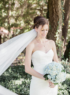 Bride poses under the oak tree, Pepper Plantation, Awendaw, South Carolina. Kate Timbers Photography. http://katetimbers.com