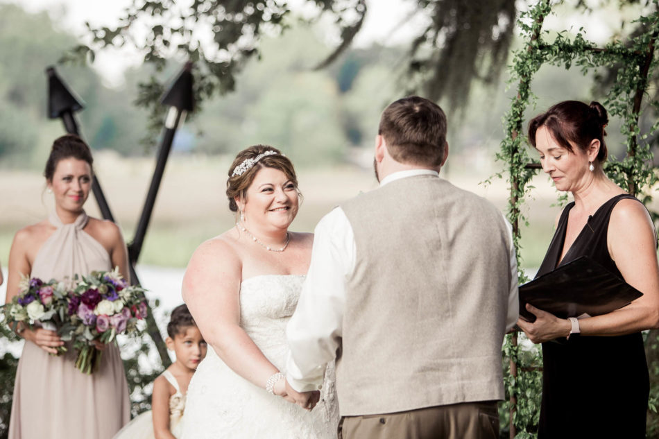 Bride and groom exchange vows, Magnolia Plantation. Kate Timbers Photography. http://katetimbers.com