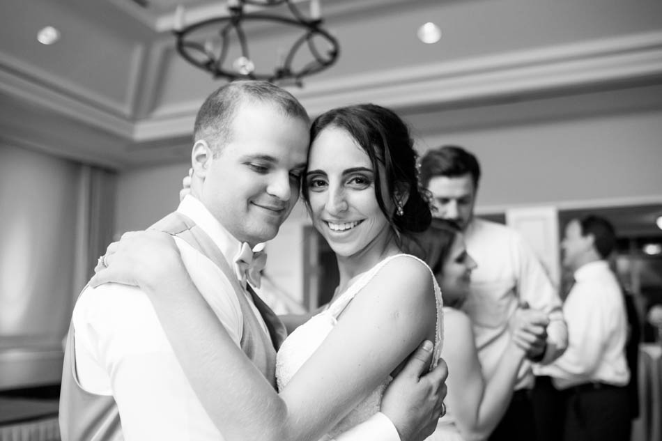 Bride and groom dance at reception with fog, Daniel Island Club. Kate Timbers Photography. http://katetimbers.com