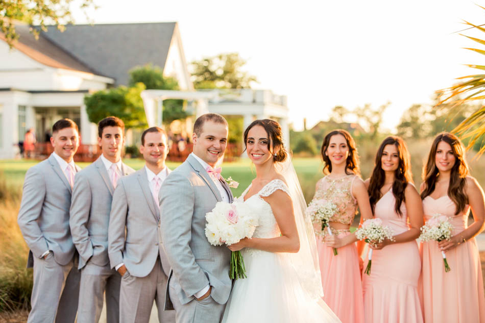 Wedding party pose together, Daniel Island Club. Kate Timbers Photography. http://katetimbers.com