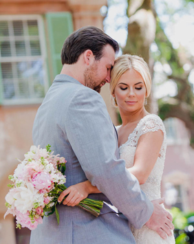 Bride and groom stand together, College of Charleston Cistern, South Carolina. Kate Timbers Photography. http://katetimbers.com