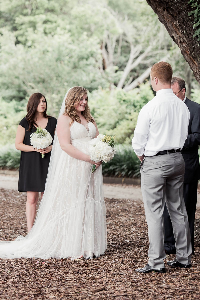 Bride and groom exchange vows, Hampton Park, Charleston, South Carolina. Kate Timbers Photography. http://katetimbers.com