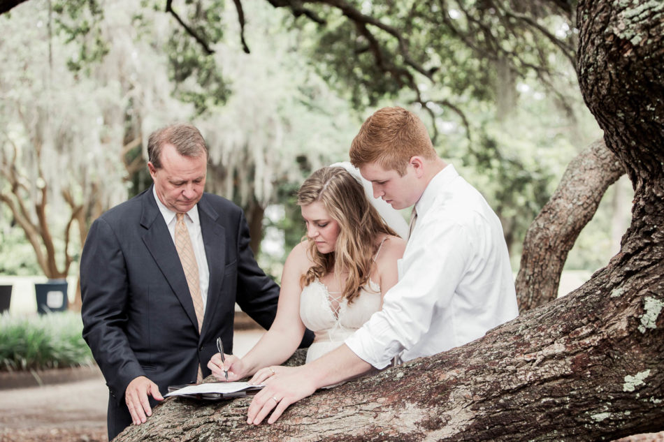 Bride and groom sign marriage license, Hampton Park, Charleston, South Carolina. Kate Timbers Photography. http://katetimbers.com