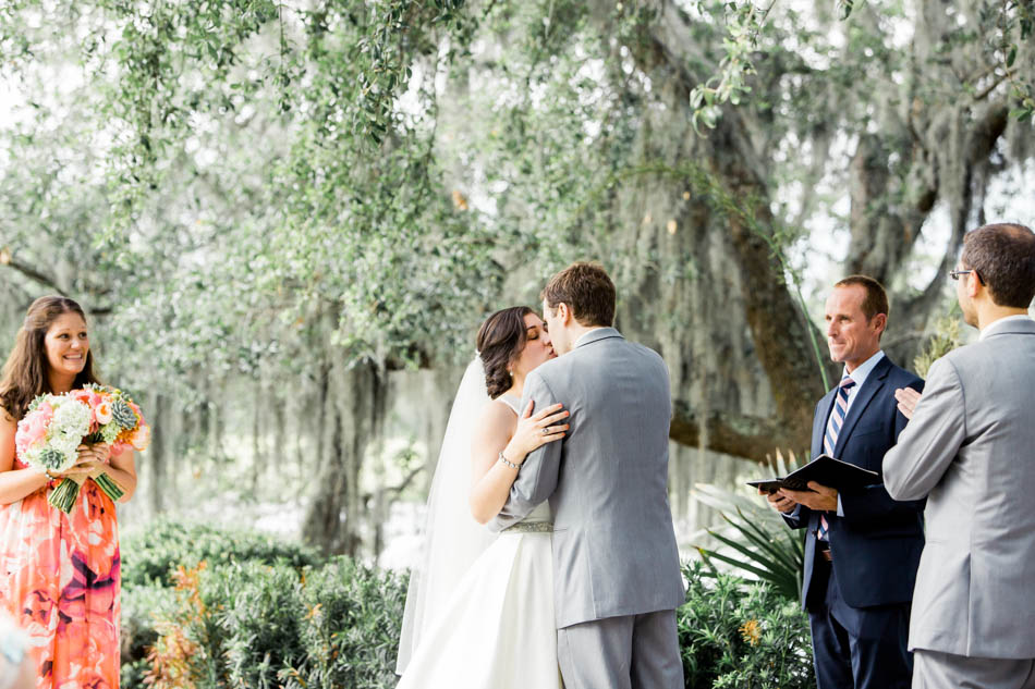Bride and groom kiss, I'on Creek Club, Mt Pleasant, South Carolina. Kate Timbers Photography. http://katetimbers.com