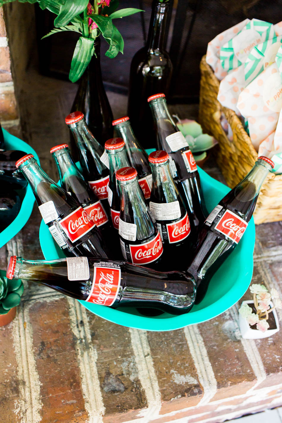 Classic coke bottles sit in a bucket, I'on Creek Club, Mt Pleasant, South Carolina. Kate Timbers Photography. http://katetimbers.com