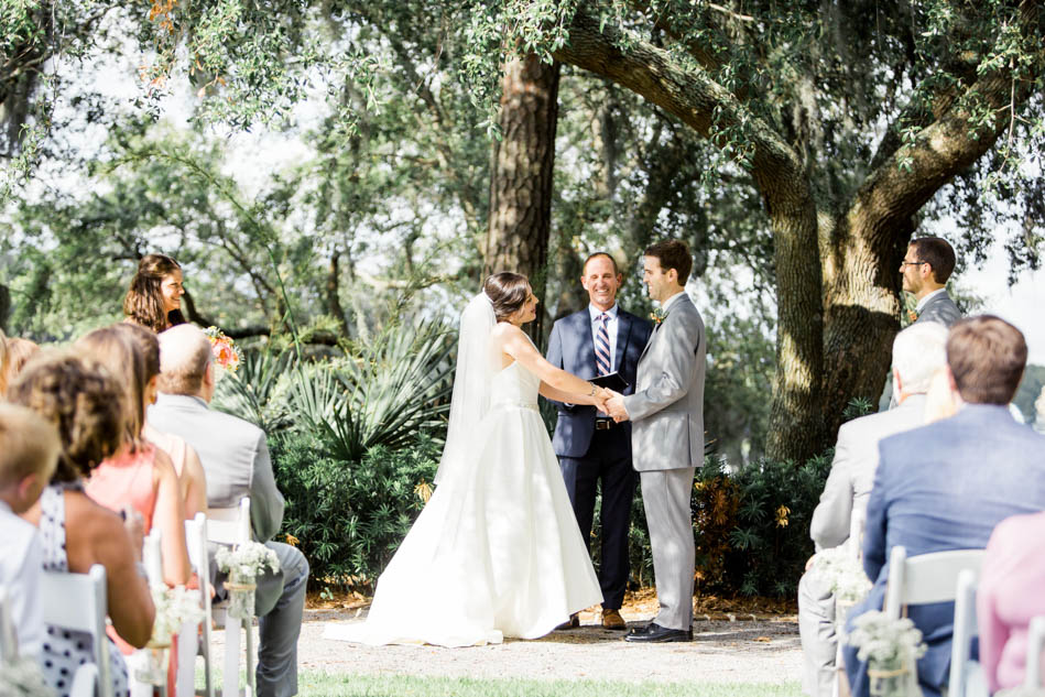 Bride and groom exchange vows, I'on Creek Club, Mt Pleasant, South Carolina. Kate Timbers Photography. http://katetimbers.com