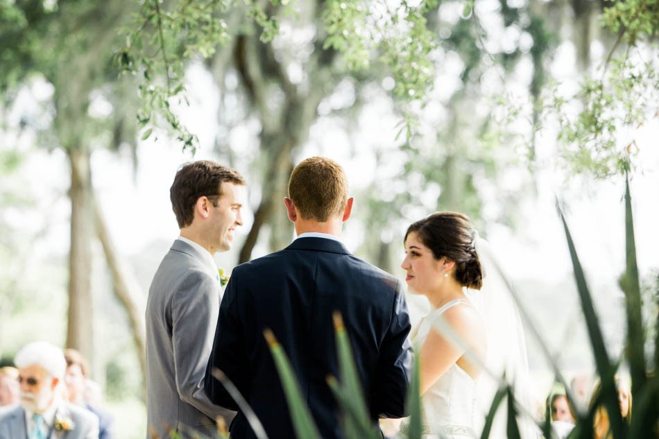 Bride and groom exchange vows, I'on Creek Club, Mt Pleasant, South Carolina. Kate Timbers Photography. http://katetimbers.com