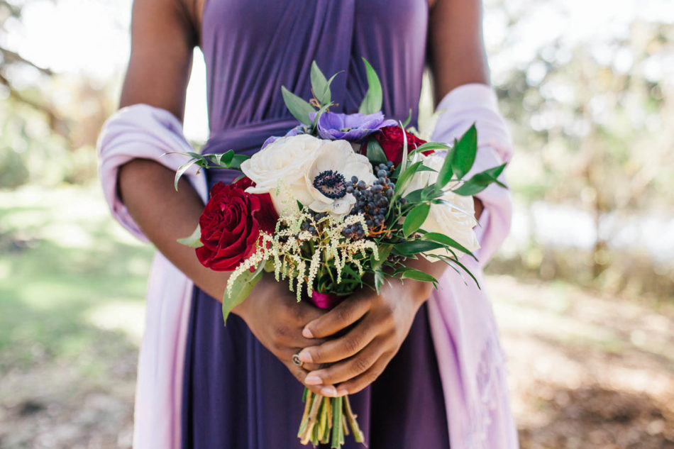 Bridesmaid holds bouquet, Boone Hall Plantation, Charleston, South Carolina. Kate Timbers Photography. http://katetimbers.com #katetimbersphotography // Charleston Photography // Inspiration