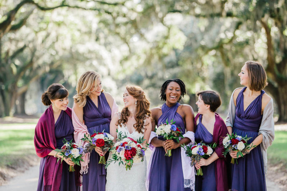 Bride and bridesmaids stand on avenue of oaks, Boone Hall Plantation, Charleston, South Carolina. Kate Timbers Photography. http://katetimbers.com #katetimbersphotography // Charleston Photography // Inspiration