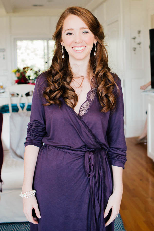 Bride smiles in purple robe, Isle of Palms, Charleston, South Carolina. Kate Timbers Photography. http://katetimbers.com #katetimbersphotography // Charleston Photography // Inspiration
