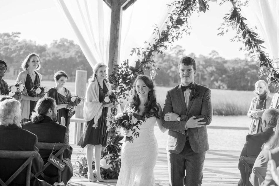 Bride and groom walk down the aisle, Boone Hall Plantation, Charleston, South Carolina. Kate Timbers Photography. http://katetimbers.com #katetimbersphotography // Charleston Photography // Inspiration