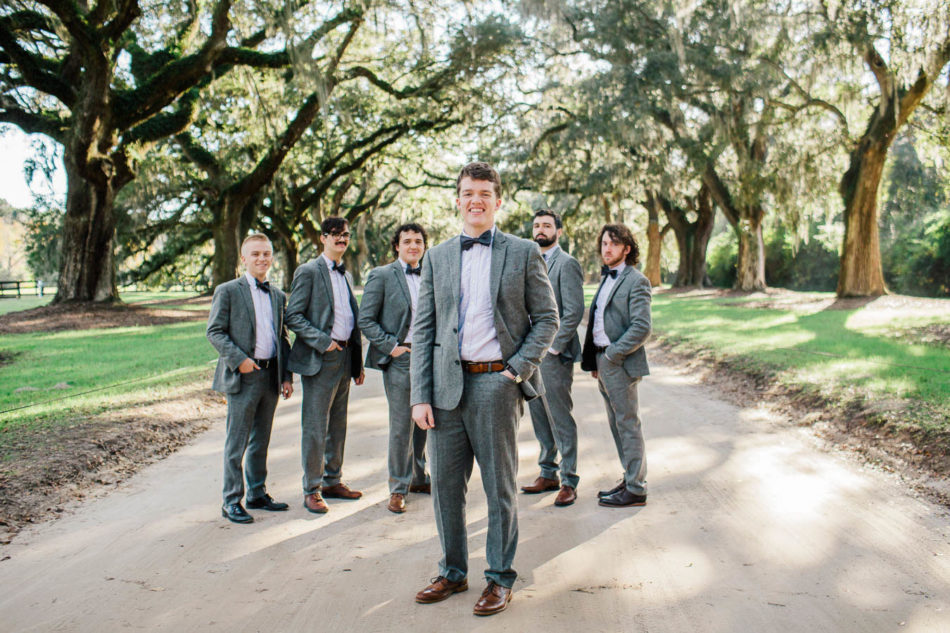 Groom and groomsmen stand at Avenue of Oaks, Boone Hall Plantation, Charleston, South Carolina. Kate Timbers Photography. http://katetimbers.com #katetimbersphotography // Charleston Photography // Inspiration