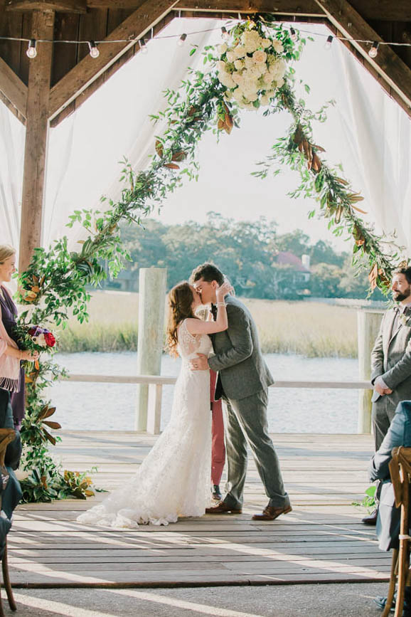 Bride and groom kiss, Boone Hall Plantation, Charleston, South Carolina. Kate Timbers Photography. http://katetimbers.com #katetimbersphotography // Charleston Photography // Inspiration