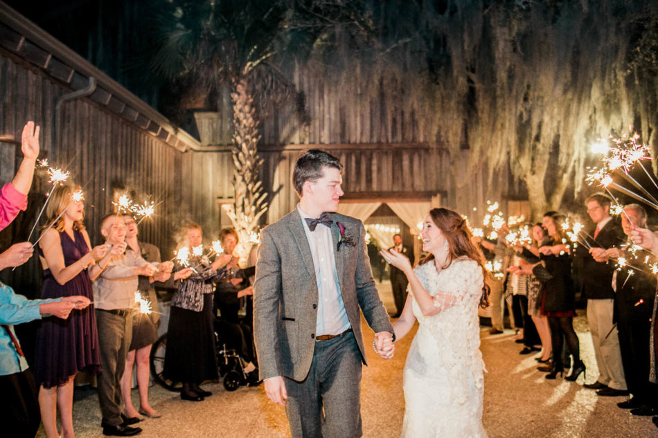 Bride and groom have sparkler exit, Boone Hall Plantation, Charleston, South Carolina. Kate Timbers Photography. http://katetimbers.com #katetimbersphotography // Charleston Photography // Inspiration